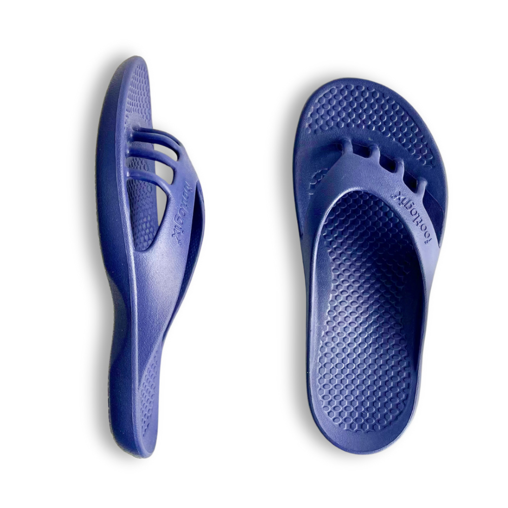 Comfeeze by Footlogix recovery sandals show the side view and top view. Featuring built in toe separators, optimal arch support, soft EV foam cushion, and textured footbed to promote circulation