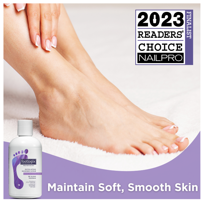 Close-up of smooth, well-cared-for bare feet resting on a soft white surface, with a hand gently touching one ankle. A Footlogix Exfoliating Seaweed Scrub bottle is shown in the bottom left corner. The image includes a “2023 Readers’ Choice Finalist” badge from NailPro and a banner that reads “Maintain Soft, Smooth Skin.”